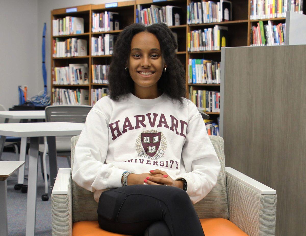 Senior Leah Tadese sports the sweatshirt of her future school, Harvard University