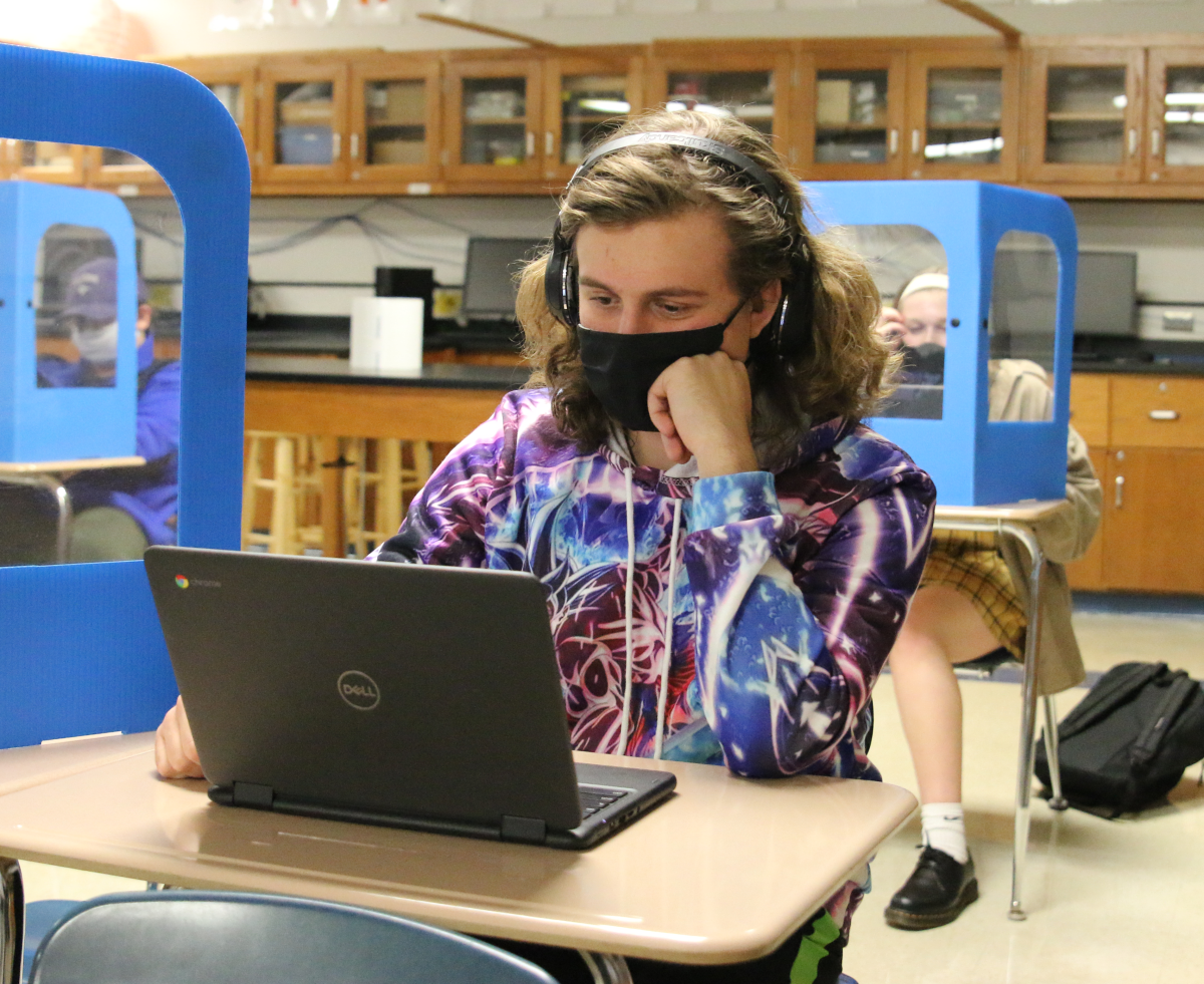 Junior Noah Salmon using his new Chromebook, provided by the Bexley Education Foundation, in class. (Photo by Margaret Zirwas)