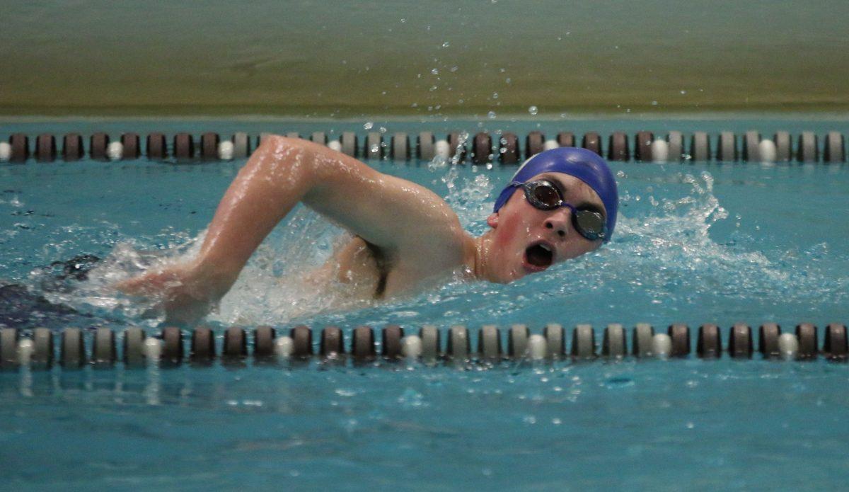 Junior Owen Tipton swims the 100 yard freestyle at the MSL meet. (Photo by Will Meyer)