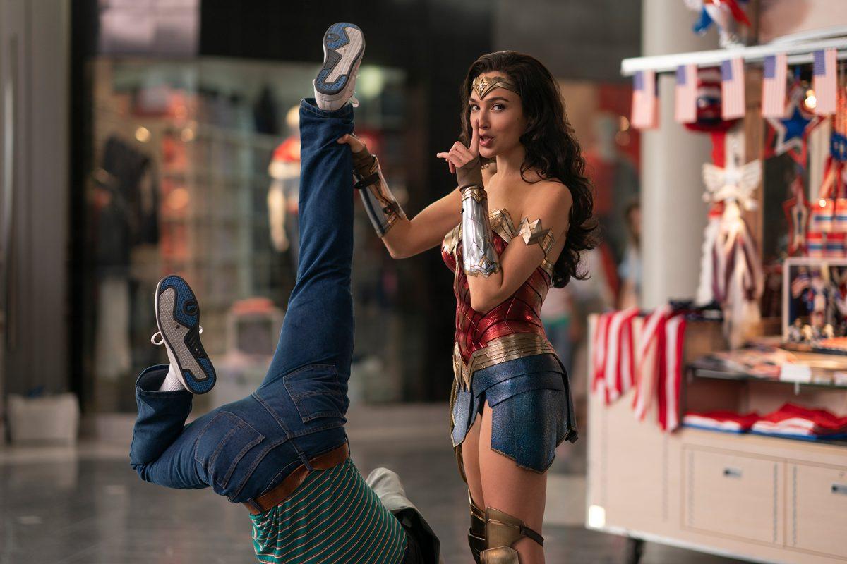 Wonder Woman (Gal Gadot) pictured after stopping an attempted robbery. (Fair us from Rolling Stone)