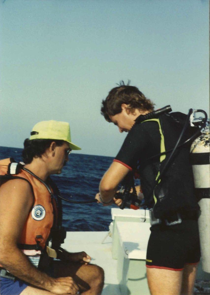 Scott Logsdon helps to prepare his student for their dive in The Bahamas. Now a biology teacher at Bexley, Logsdon's life has changed significantly since 1991. (Photo given to The Torch by Scott Logsdon)