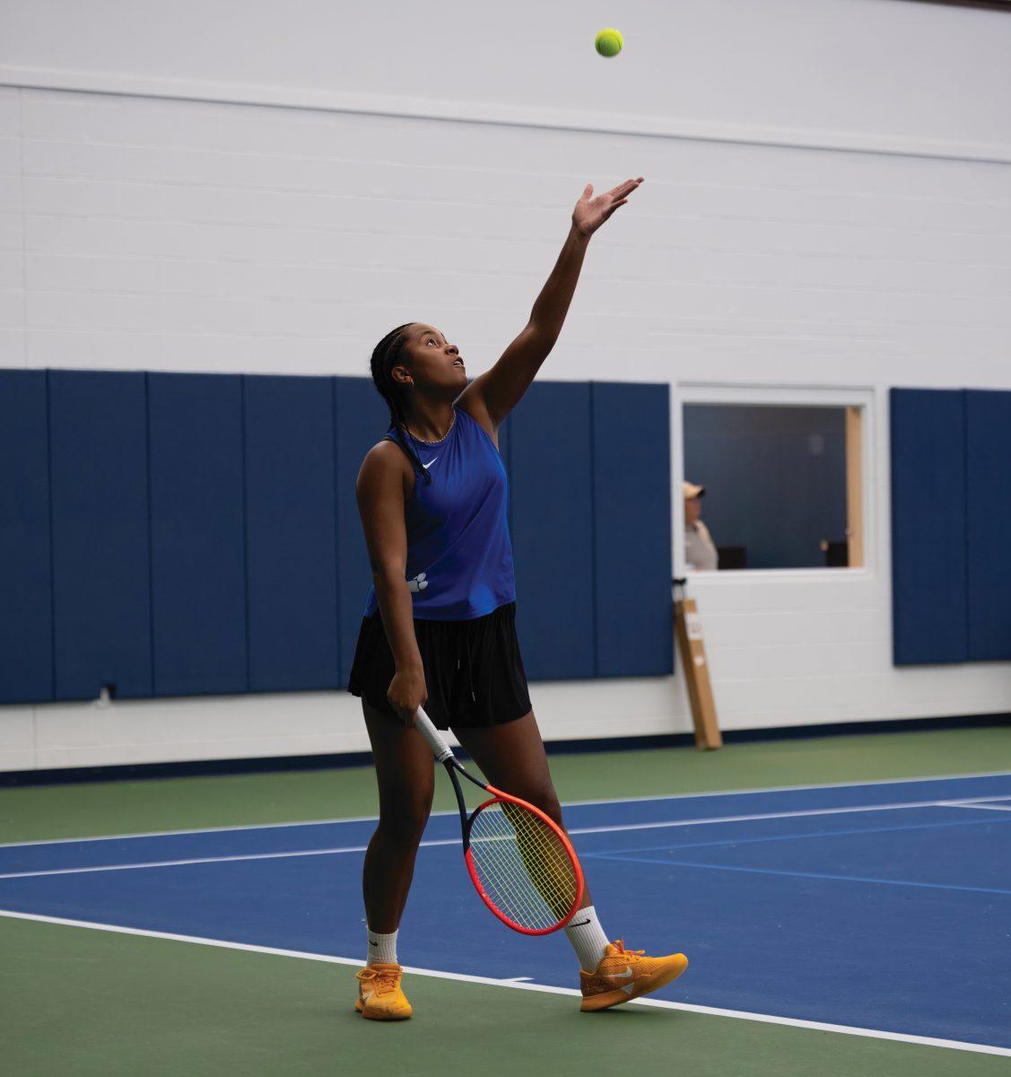 Sophomore Amiya Bowles prepares to hit a serve at the state tennis championship Oct. 20. (Photo courtesy of Mike Nolan)