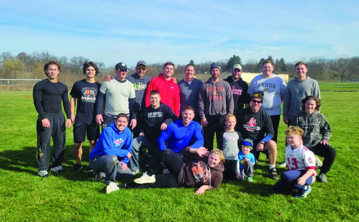 Intervention specialist Jon Robertson and his family celebrate their Thanksgiving football game. (Courtesy of Jon Robertson)