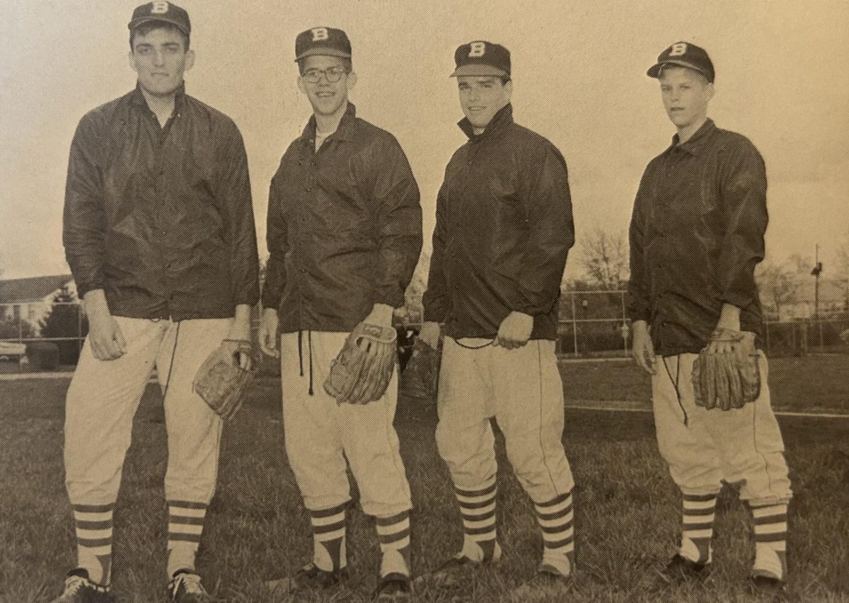 1964 Bexley Graduate Same Geldis (left) stands with  his baseball teammates at the high school.