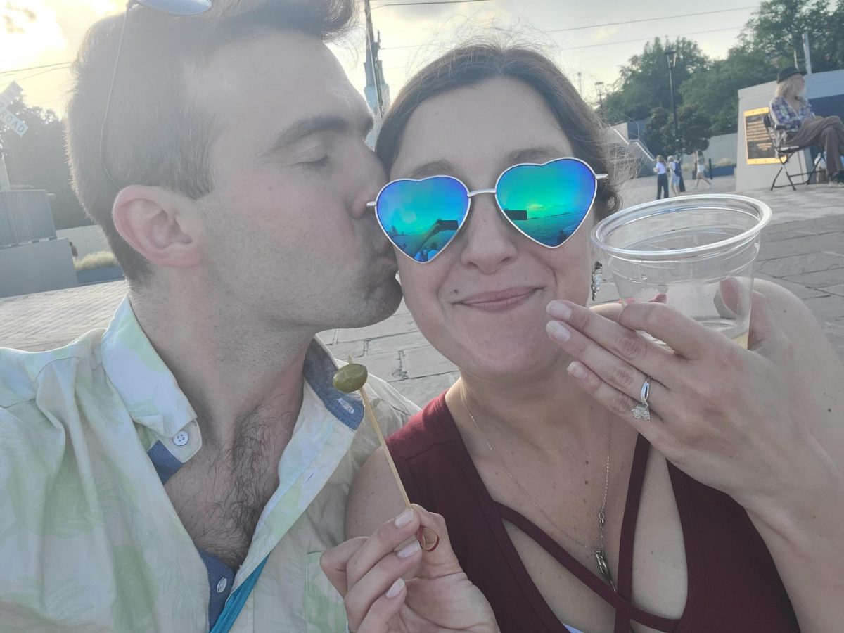 Science teacher Brandon Bright kisses his fiance Nicole Fontaine on the cheek. (Courtesy of Brandon Bright)
