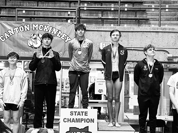 Monus and Drummond win states, girls swim team places third
