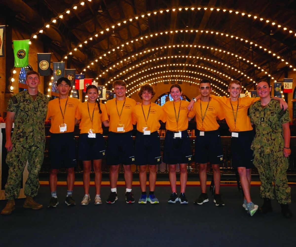 Senior Kyra Duffee, sixth from left, stands with her group from a Naval Academy summer seminar.

