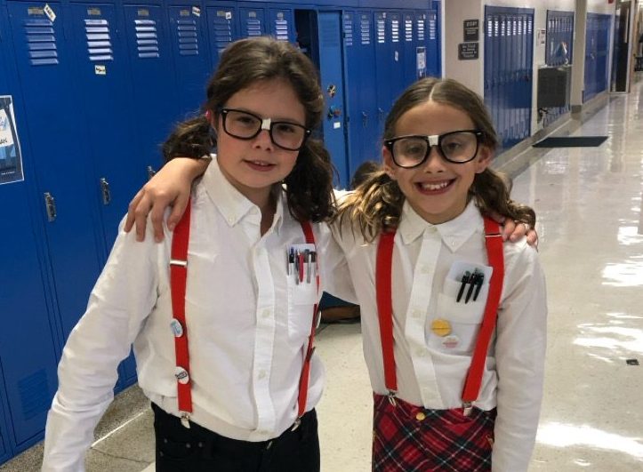 Sophomores Emma Solomon and Coco Kaplansky model their nerd halloween costumes in Cassingham Elementary School. (Photo courtesy of Emma Solomon)