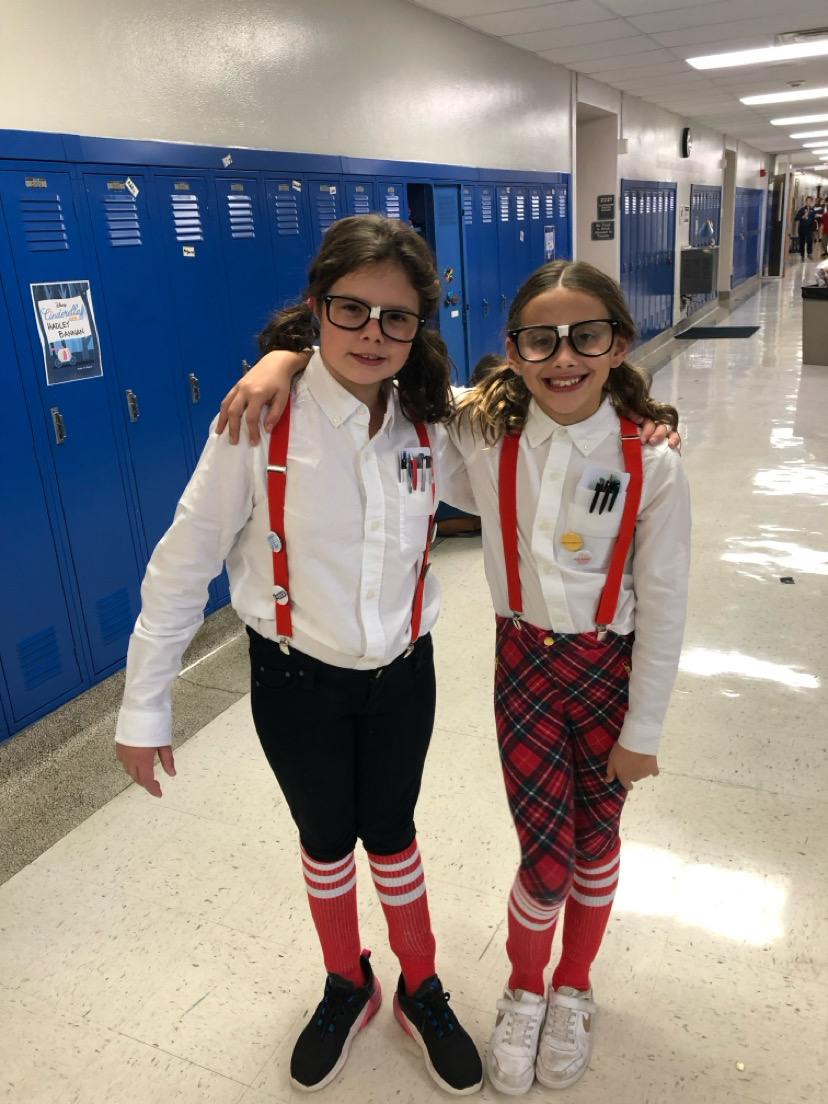 Sophomores Emma Solomon and Coco Kaplansky model their nerd halloween costumes in Cassingham Elementary School (photo courtesy of Emma Solomon). 