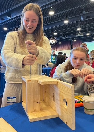 Juniors Talbot Kyle and Avery Chapman build a squirrel house at the Eco Summit event at the Columbus Zoo. (Photo courtesy of Talbot Kyle)
