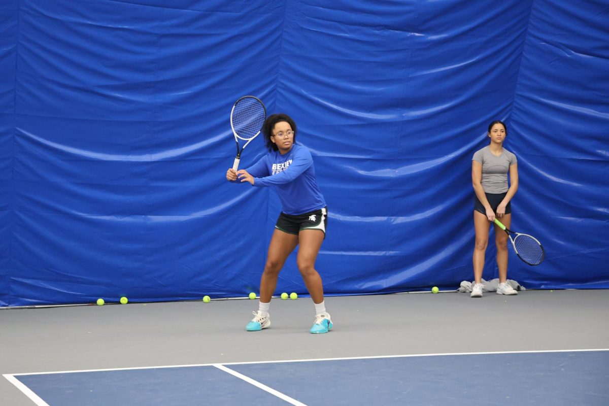 Senior Amiya Bowles prepares to return the ball at a practice Feb. 3.