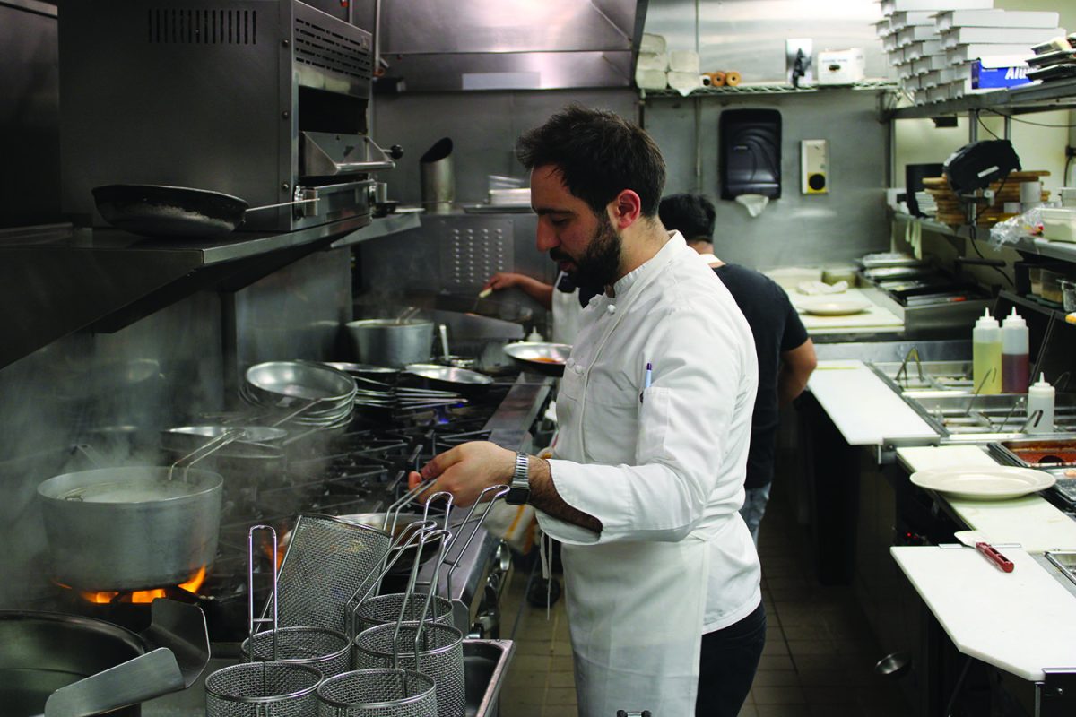 Domenico Mangano, son of restaurant founder Giuseppe Mangano, prepares a meal at Giuseppe’s Ritrovo.