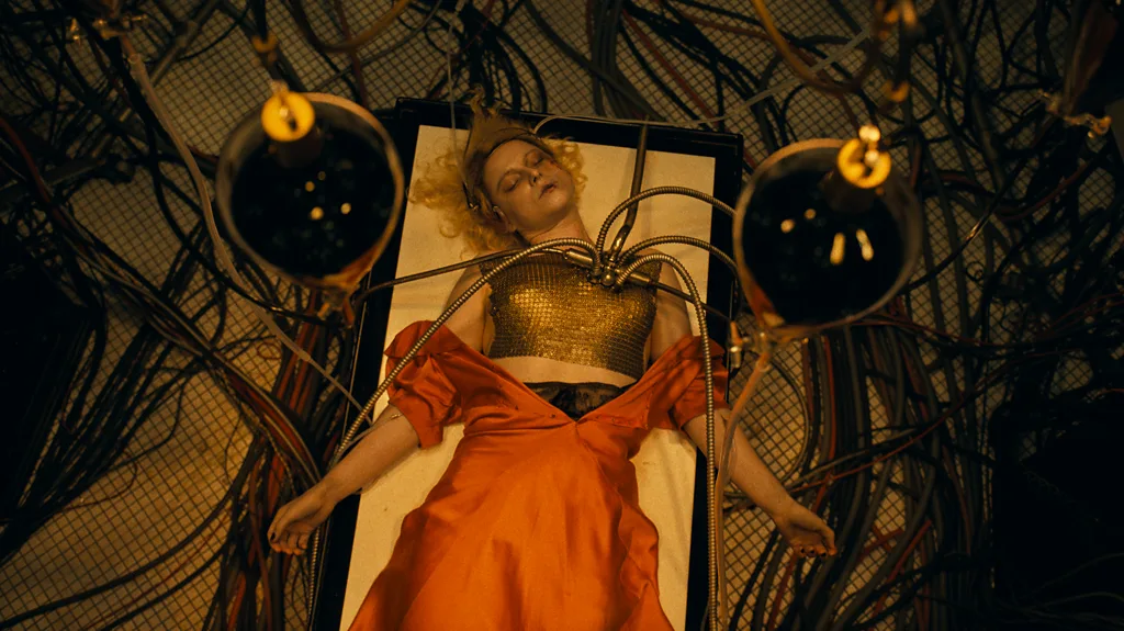 The Bride (Jessie Buckley) is brought back to life. (Fair use Warner Brothers)