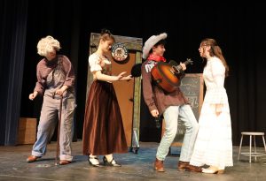 Sophomore Izzy Coey, freshman Lily Turkovich, sophomore Zeke Moses and freshman Maya Hernandez-Romito perform their play “Murder Motel, Flip it Around, Wild West.” 

